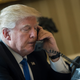 President Donald Trump speaks on the phone with Russian President Vladimir Putin in the Oval Office of the White House on Jan. 28, 2017, in Washington, D.C.